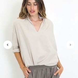 A short thing Penelope top in color ecru